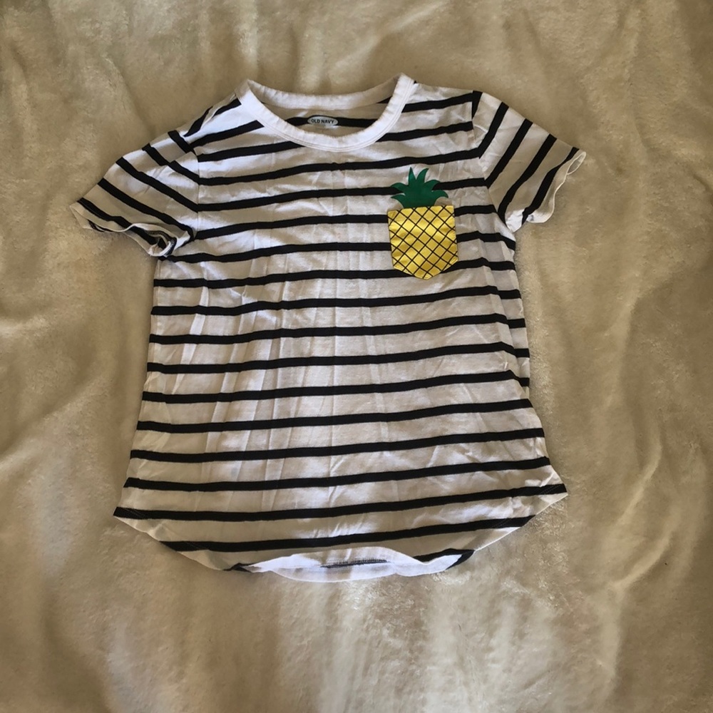 Black and white striped shirt with pineapple.